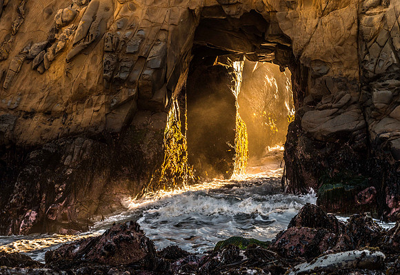 Sun Shining Through Arch at Pfeiffer Beach, Los Padres National Forest, California